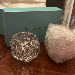 Tiffany crystal votive’s.  Never been used comes with original box (2)